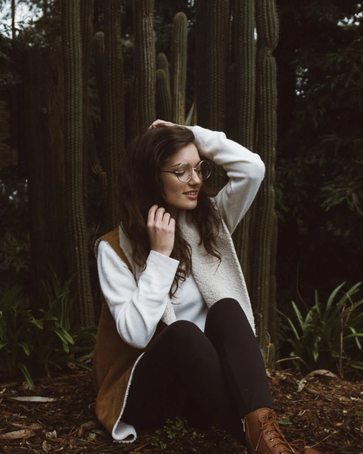 Woman wearing a sweater in transitional weather