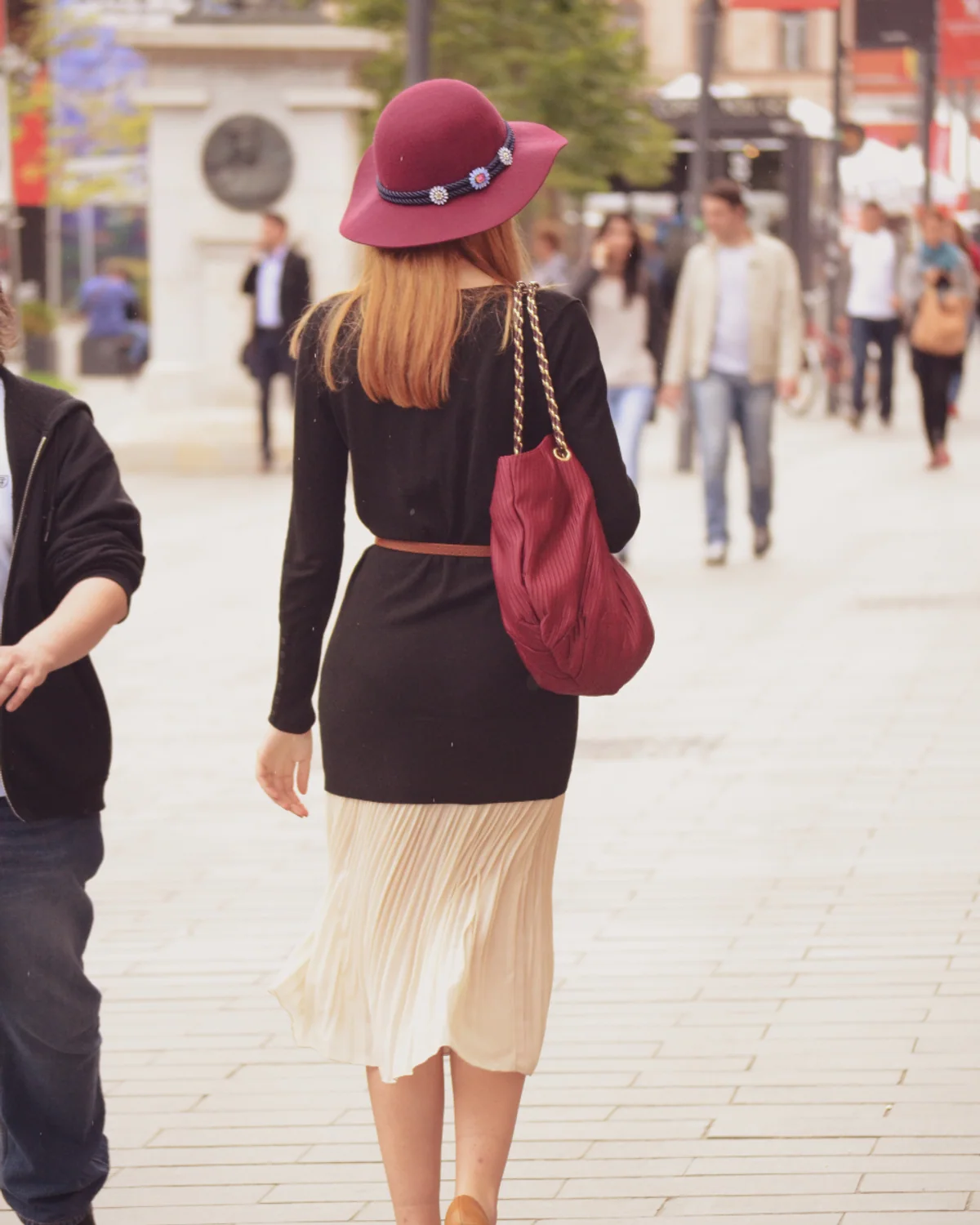 Woman wearing a midi dress in the city