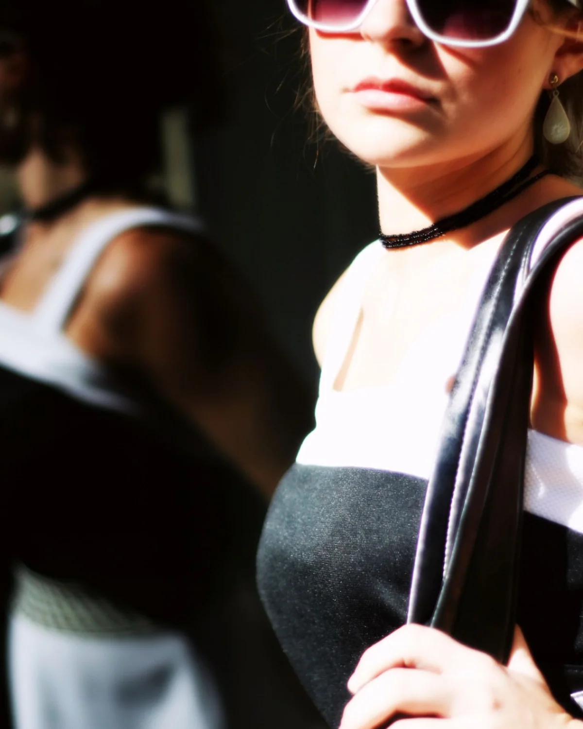 Woman in a polished modern outfit on a city street
